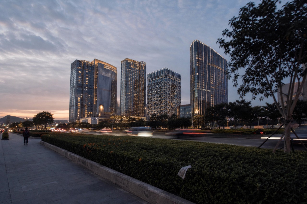 Hotel towers of the City of Dreams resort in Cotai Macau seen at dusk