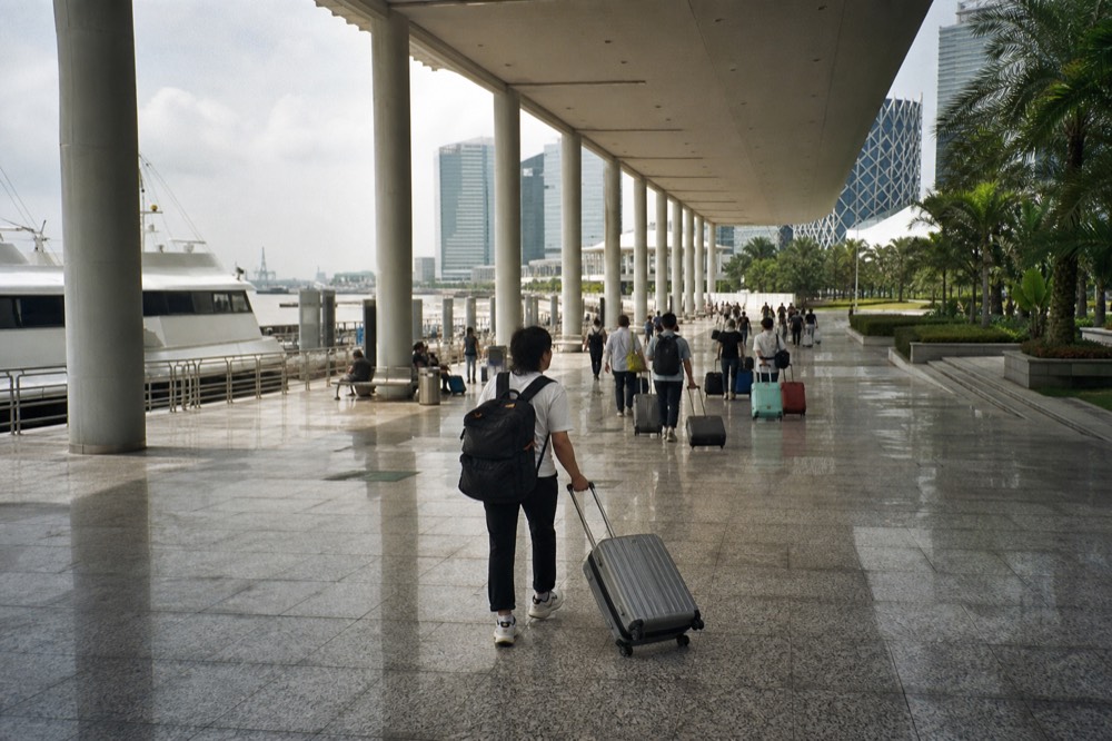 The Sheung Wan ferry terminal concourse with departure boards